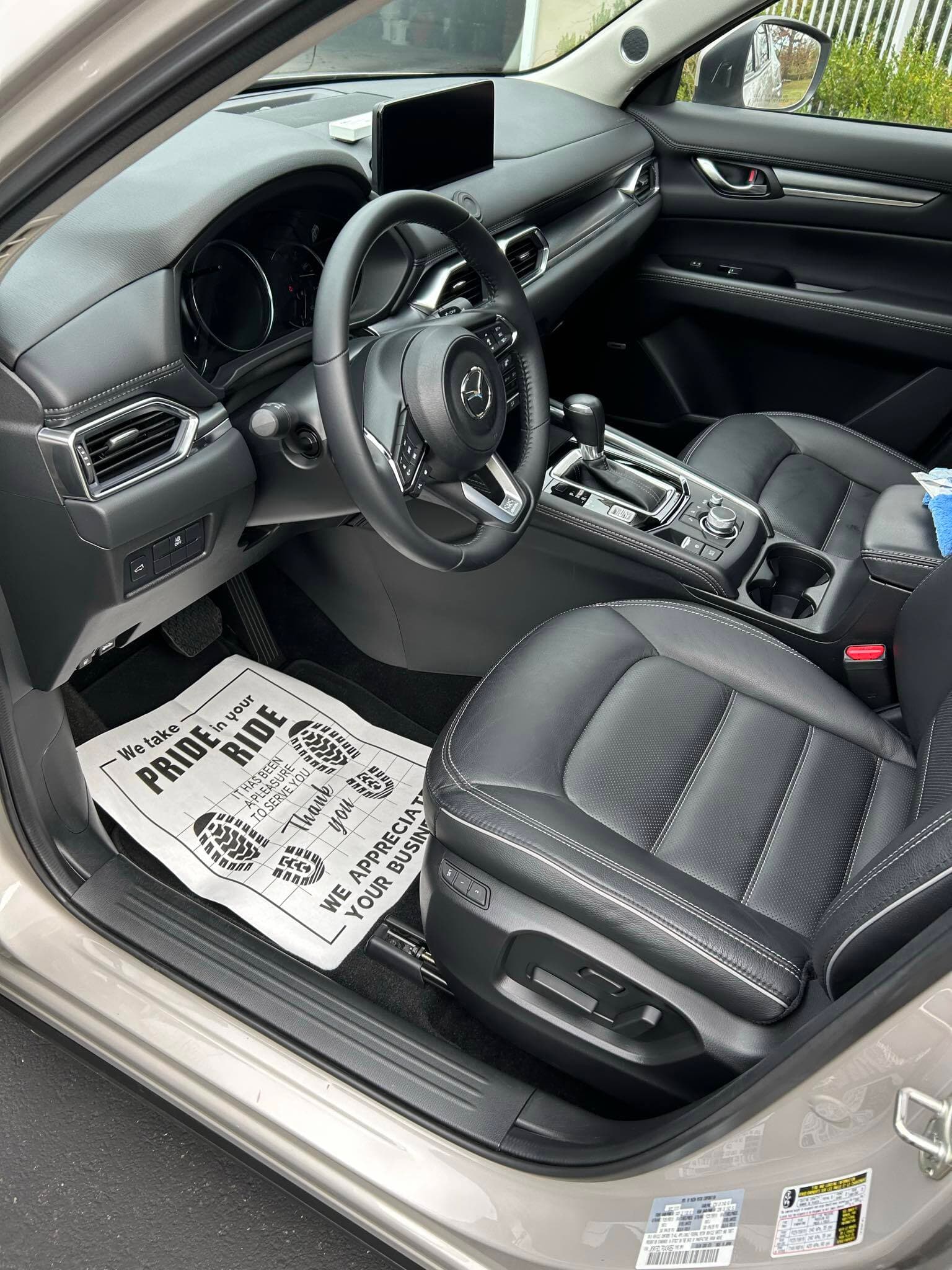 Mazda CX-5 interior after a deep clean, spotless black leather
