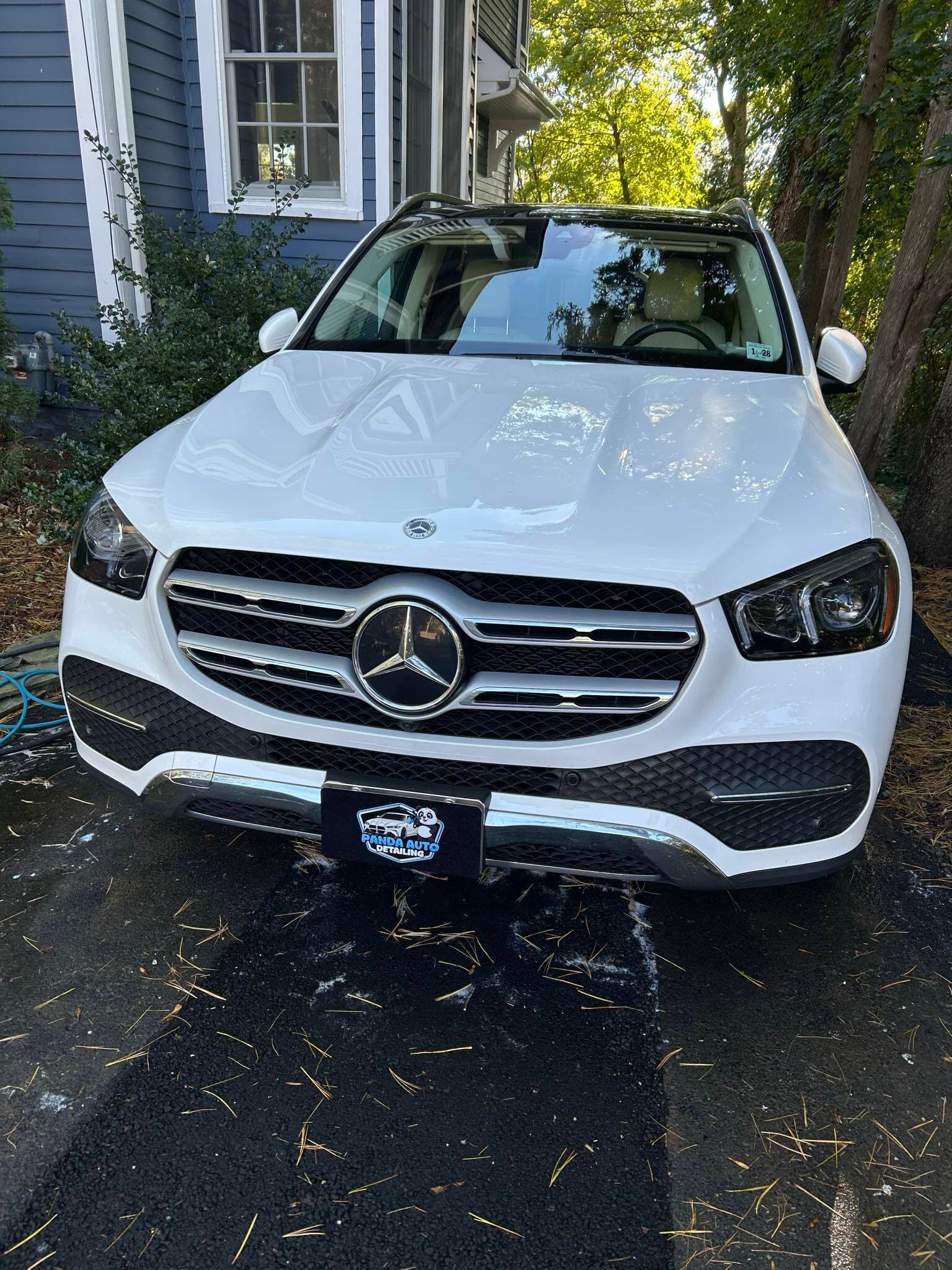 Mercedes GLE in a driveway after a Panda Auto Detailing mobile detail appointment